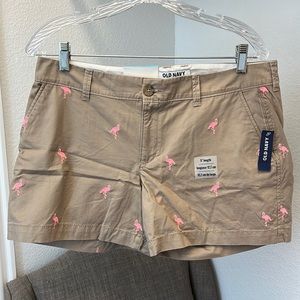 Old Navy khaki chino shorts with neon pink flamingos
